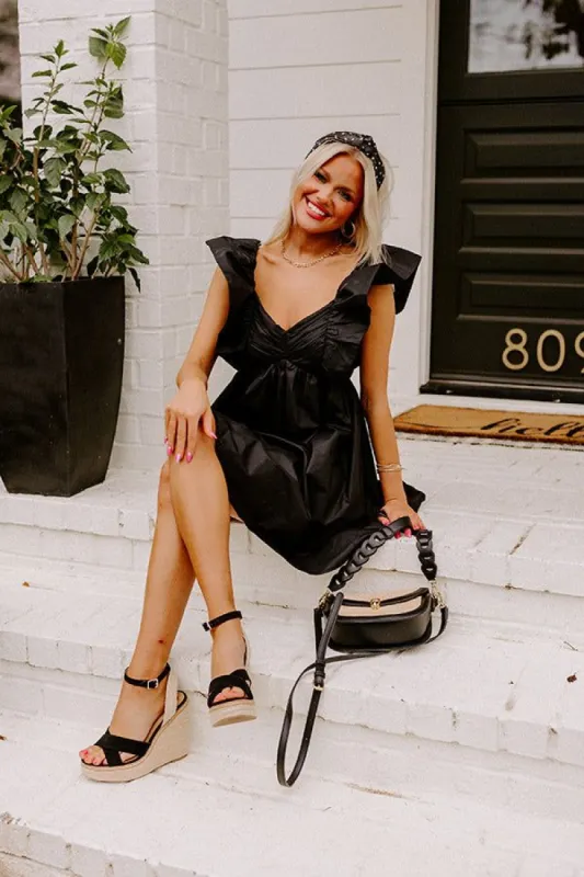 Cityscape Splendor Babydoll Dress in Black sold by Impressions