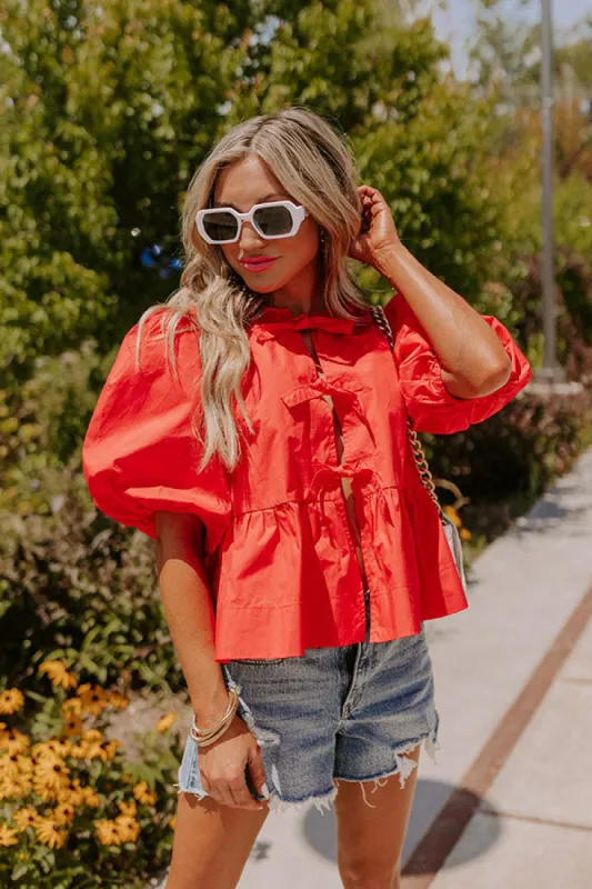 A Little Bit Flirty Front Tie Top in Red sold by Impressions