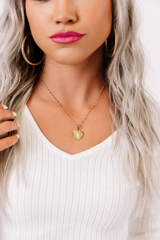 Sacred Heart Necklace sold by Impressions