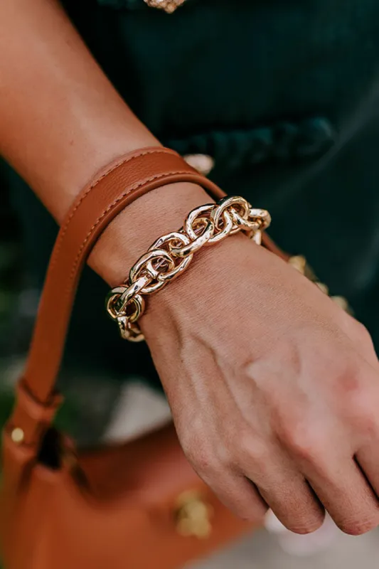 Cue The Chic Link Bracelet sold by Impressions