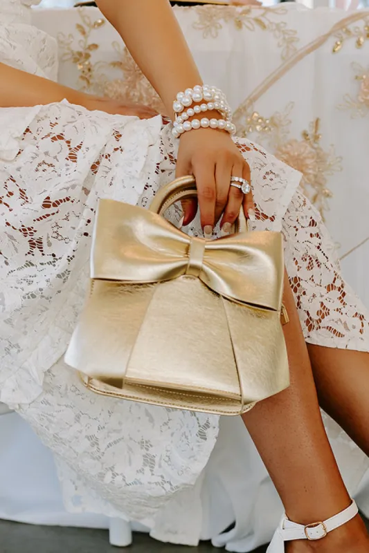 Embracing Love Purse In Gold sold by Impressions