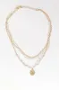 Oceanside Gala Layered Necklace in White sold by Impressions