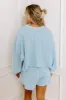 Feeling Chic Embellished Crop Sweatshirt in Sky Blue sold by Impressions