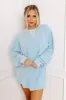 Feeling Chic Embellished Crop Sweatshirt in Sky Blue sold by Impressions