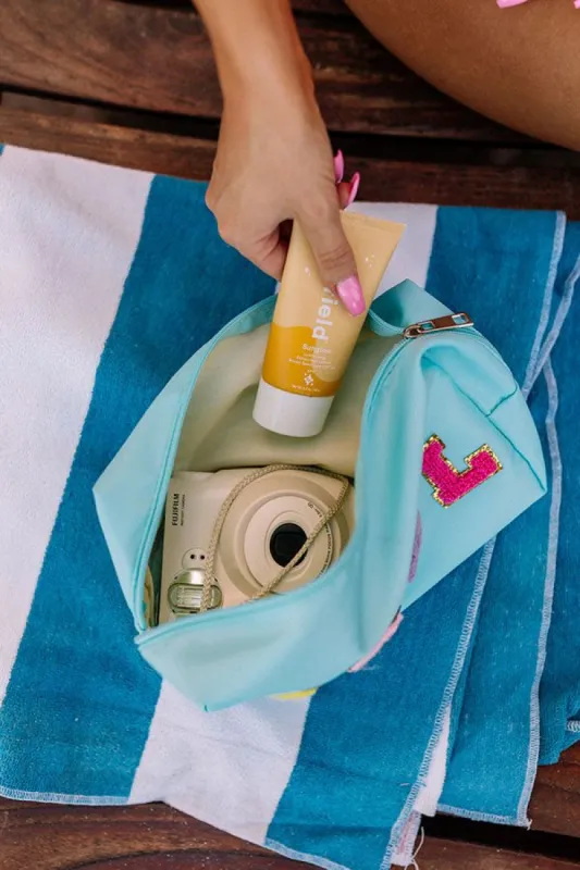 Pool Embroidered Bag In Aqua sold by Impressions