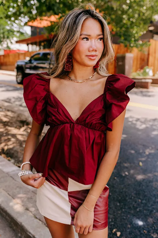 Stay Here Awhile Peplum Top In Maroon sold by Impressions