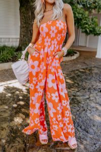 Loft Party Smocked Floral Jumpsuit in Orange sold by Impressions