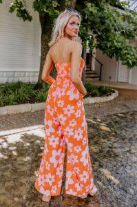 Loft Party Smocked Floral Jumpsuit in Orange sold by Impressions