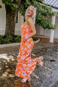 Loft Party Smocked Floral Jumpsuit in Orange sold by Impressions