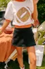 The Olivia Denim Skort in Black sold by Impressions