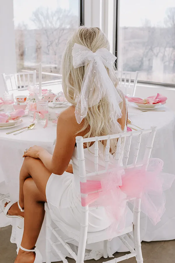 The Belle Pearl Embellished Bow Hair Clip sold by Impressions