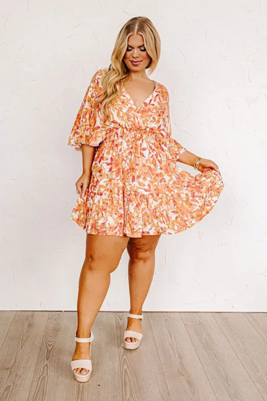 Love The Journey Floral Romper In Orange Curves sold by Impressions