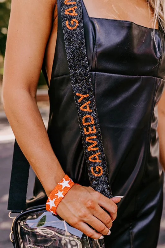 It's Gameday Beaded Bag Strap in Orange/Black sold by Impressions