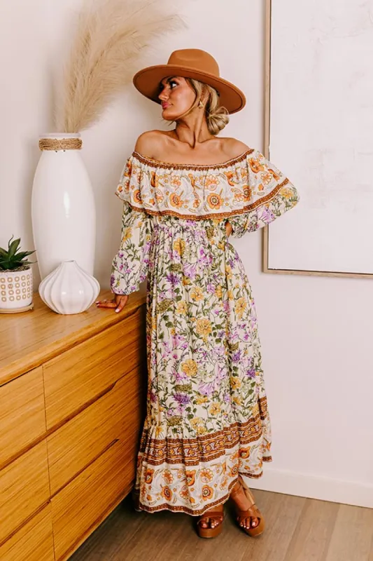 Blooming Meadow Floral Maxi in Cream sold by Impressions