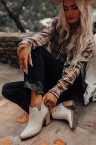 The Tuck Faux Leather Bootie sold by Impressions