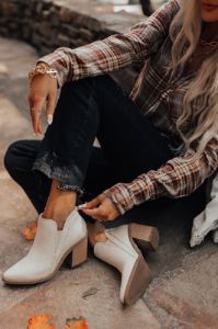 The Tuck Faux Leather Bootie sold by Impressions