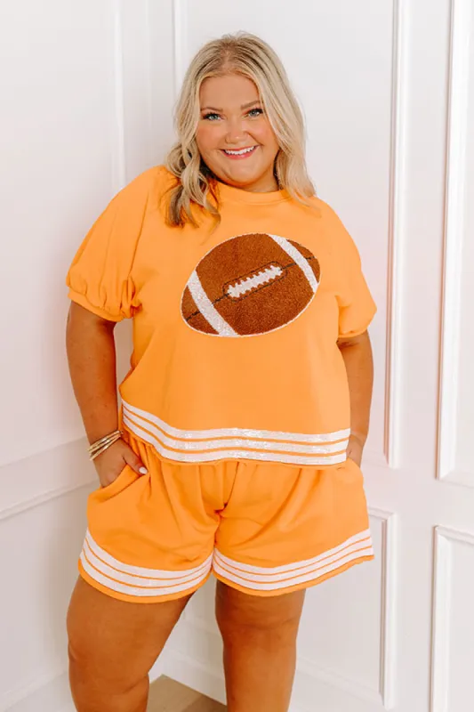 Sideline Social Embroidered Top in Orange Curves sold by Impressions