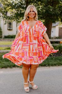 Tulip Fields Shift Dress in Tangerine Curves sold by Impressions