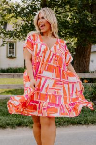 Tulip Fields Shift Dress in Tangerine Curves sold by Impressions