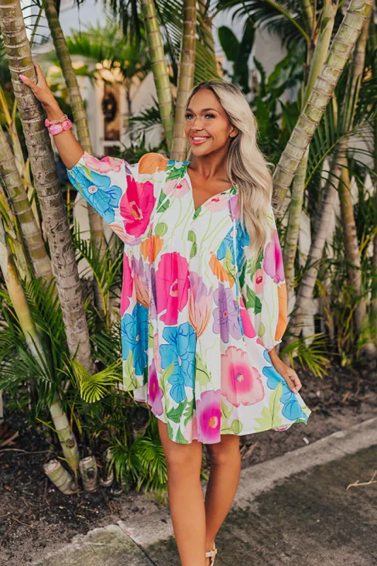 Floral Embrace Mini Dress in White sold by Impressions