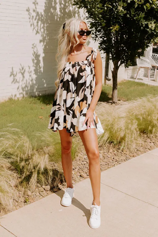 Bloom With A View Romper In Black sold by Impressions