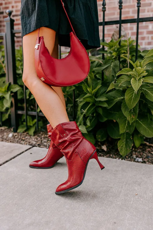 The Eliza Faux Leather Bootie in Wine sold by Impressions