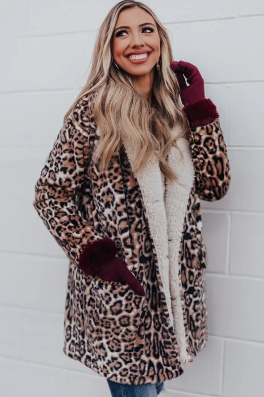 Serene Snowfall Leopard Plush Coat sold by Impressions