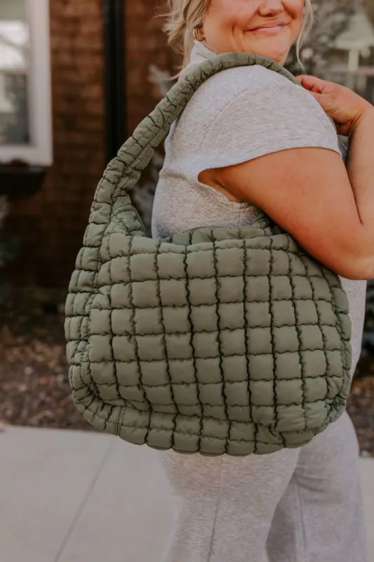 Travel Far Puffer Tote In Olive sold by Impressions
