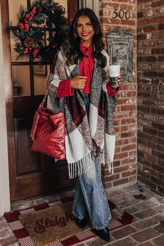 Cozy Up Fireside Plaid Poncho In Red sold by Impressions