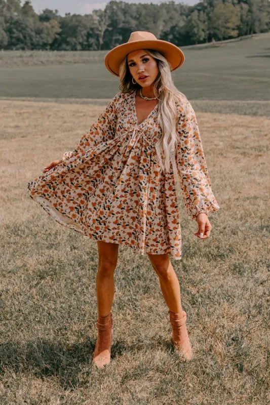 Milan Memories Floral Babydoll Dress In Iced Latte sold by Impressions