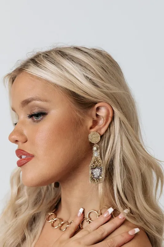 Champagne Toasts Beaded Earrings sold by Impressions