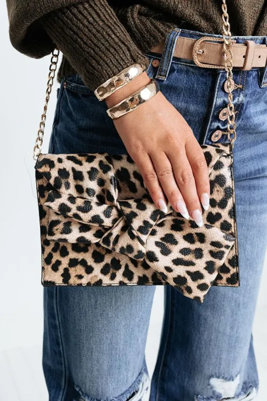 Celebrity Chic Leopard Clutch sold by Impressions