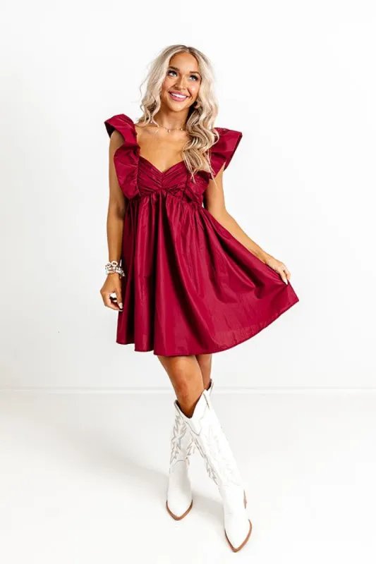 Cityscape Splendor Babydoll Dress In Wine sold by Impressions
