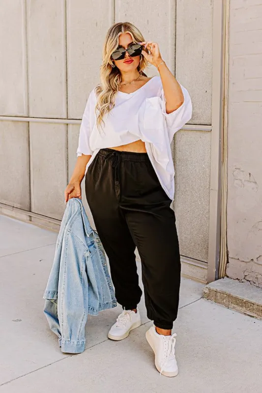 The Tryston Midrise Joggers In Black Curves sold by Impressions