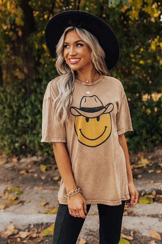 Cowboy Smiley Face Graphic Tee sold by Impressions