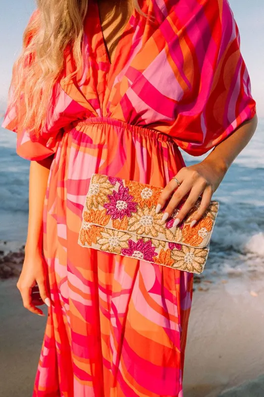 On Sunshine Time Beaded Clutch sold by Impressions