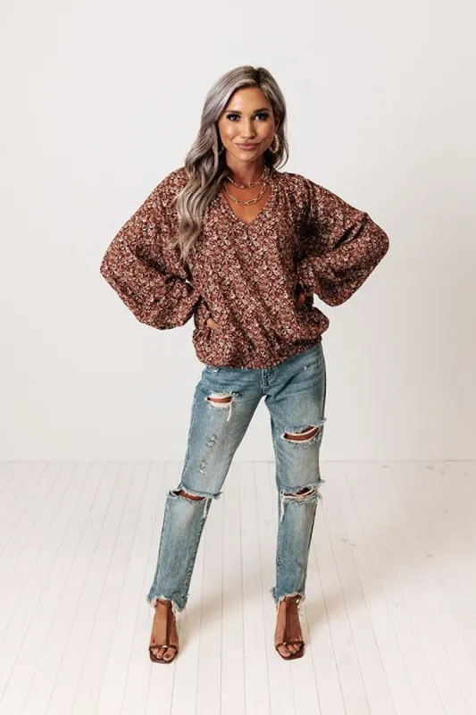 The Winette Floral Top in Rust sold by Impressions