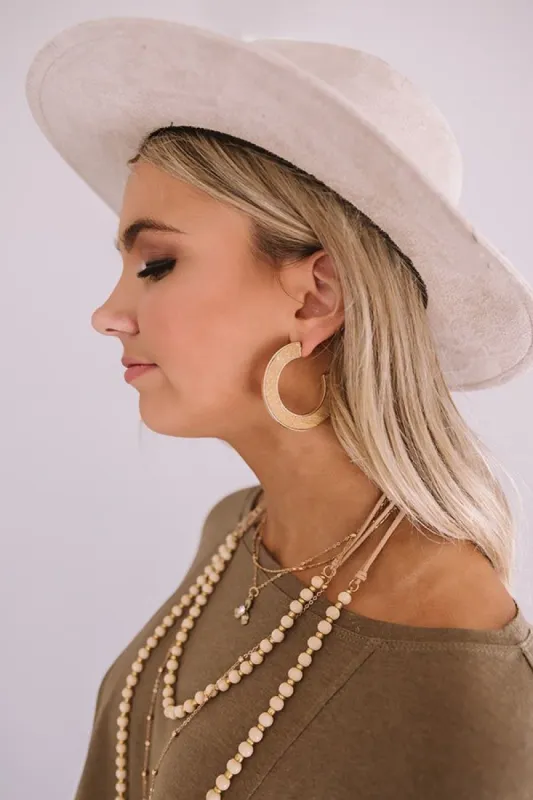 New Heights Snake Print Hoop Earrings In Beige sold by Impressions