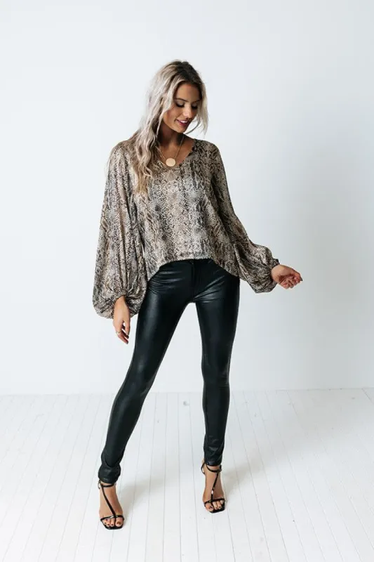 Style A La Mode Snake Print Shift Top sold by Impressions