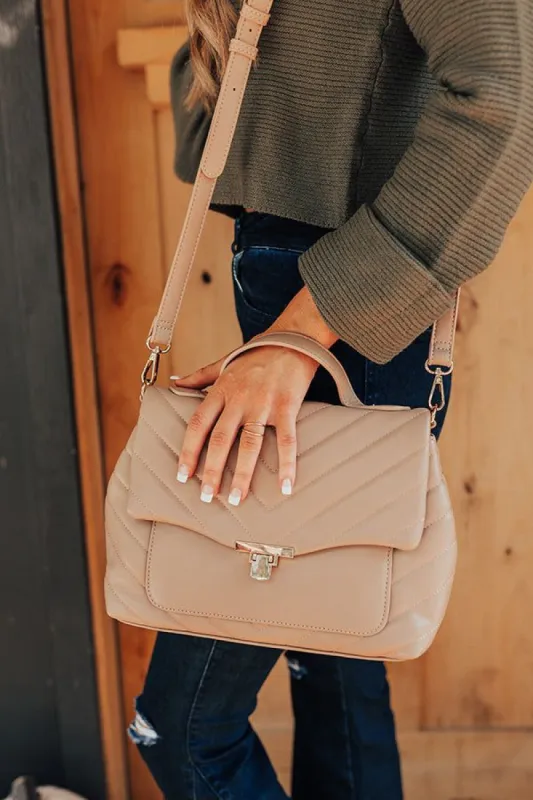 Locking Eyes Quilted Faux Leather Purse In Warm Taupe sold by Impressions
