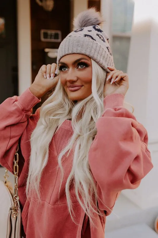 Flurries In France Faux Fur Pom Beanie in Taupe sold by Impressions