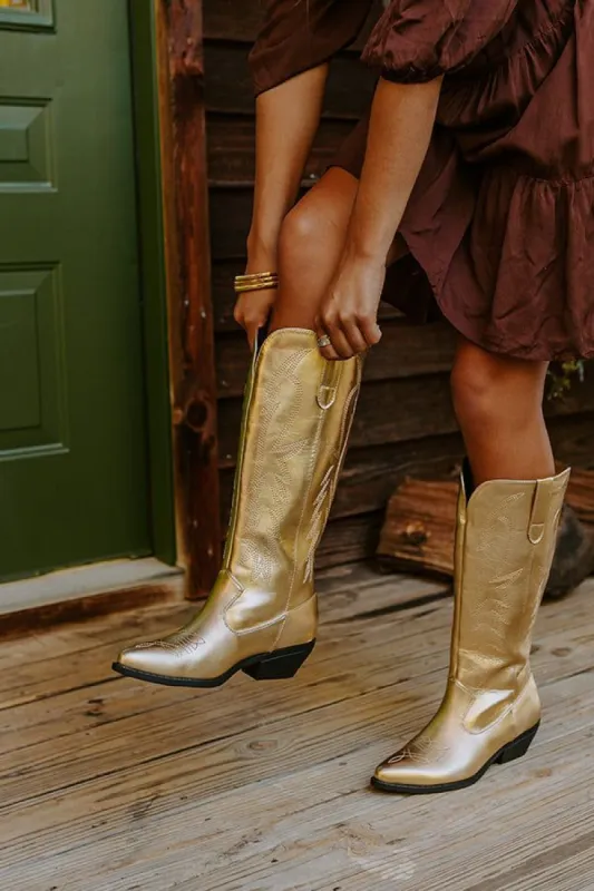 The Lockwood Metallic Cowboy Boot in Gold sold by Impressions