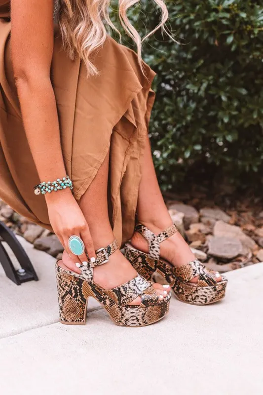 The Bali Platform Heel in Snake Print sold by Impressions