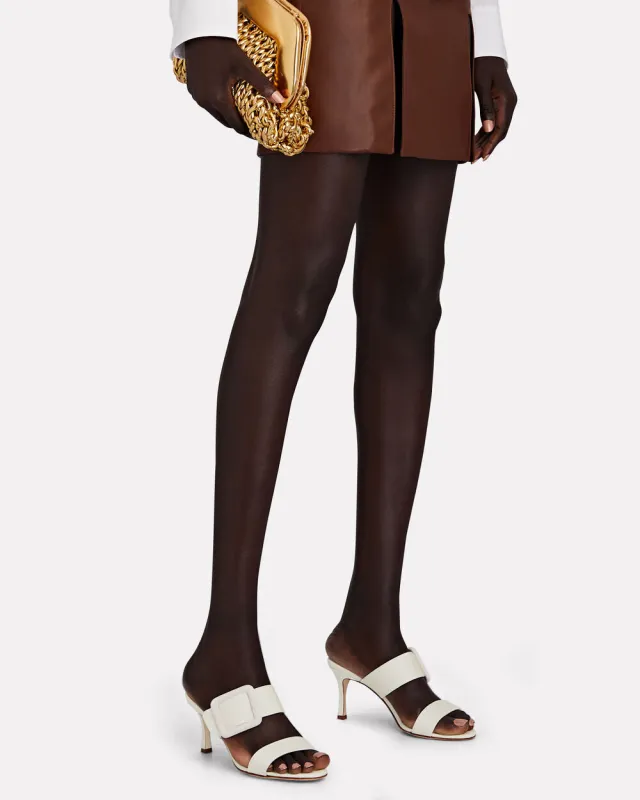 Gable Buckle Canvas Mules sold by INTERMIX