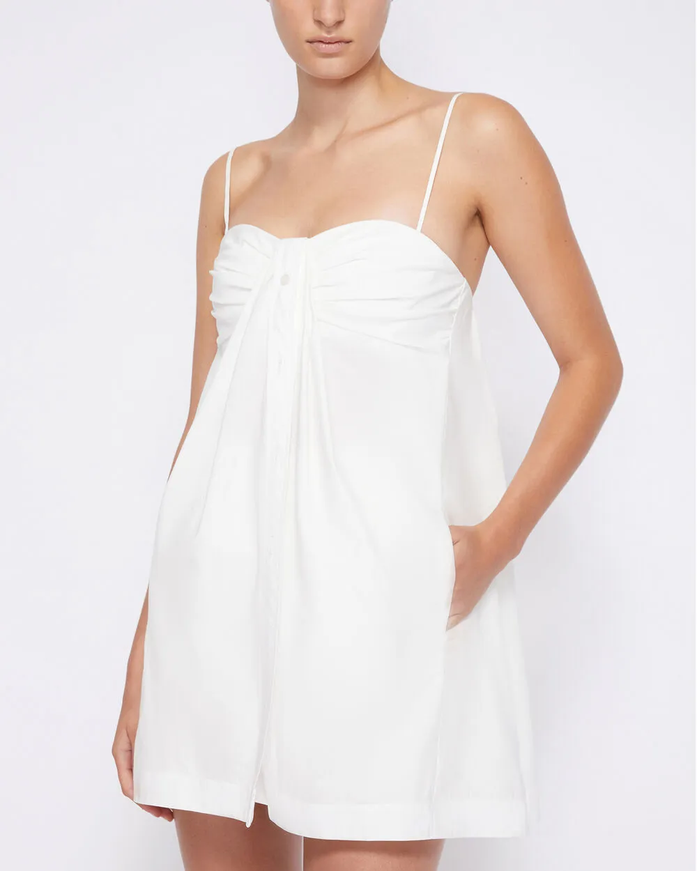 KENDALL COTTON POPLIN TWISTED BUTTON FRONT DRESS sold by INTERMIX
