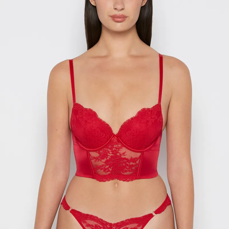 Demi Cup Bustier Bra Top in Crimson made by INTERMIX
