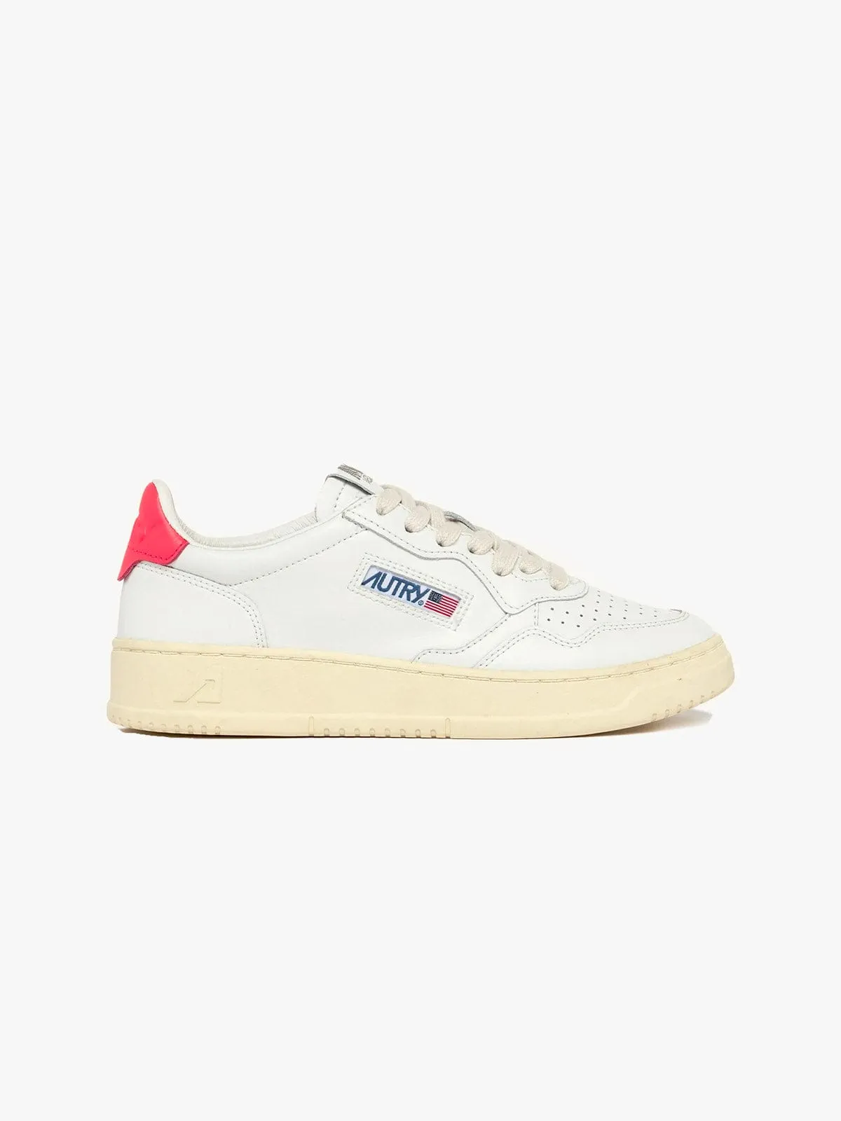 Medalist Low Trainer- Coral sold by iris