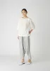 PLEATS T BASIC sold by Issey Miyake