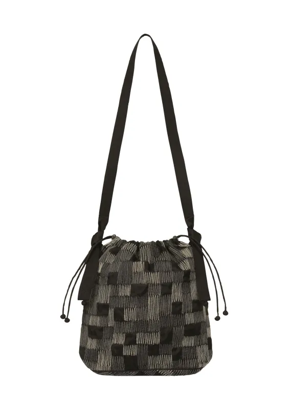 【PLEATS PLEASE】BAOBAO ISSEY MIYAKE The Edgy Appeal of Issey Miyake Purses - PurseBlog