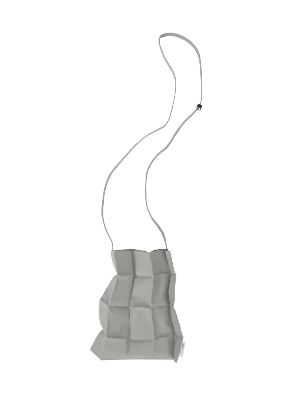 DICE PLEATS BAG sold by Issey Miyake